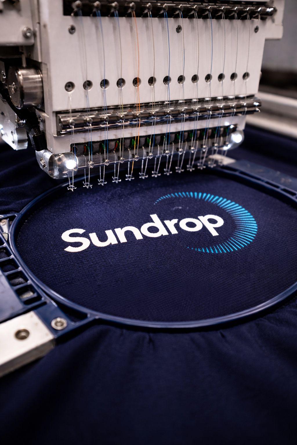 Broderie du logo Sundrop sur textile